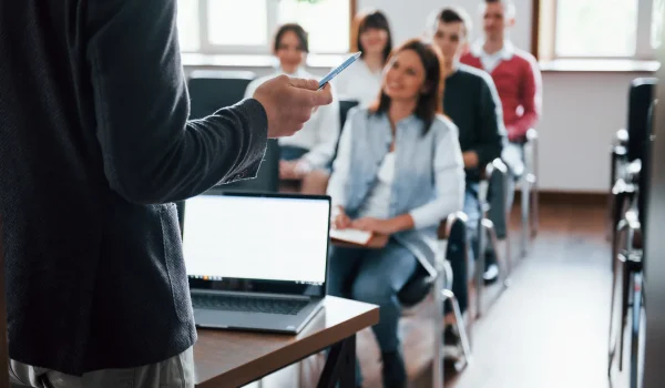 everyone-is-smiling-listens-group-people-business-conference-modern-classroom-daytime